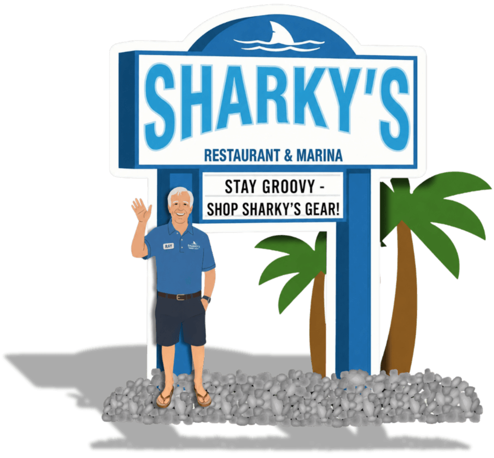 Ray waving by the Sharky's sign reading Stay Groovy — Shop Sharky's Gear!